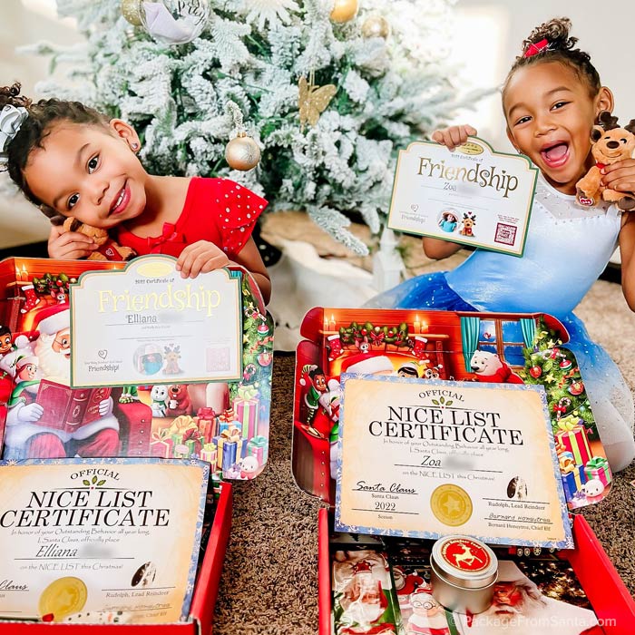 2 sisters love their letters from Santa sent from Package From Santa®!