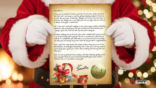 Santa in his red suit holding up a personalized letter from Santa written for a child, signed with his gold seal